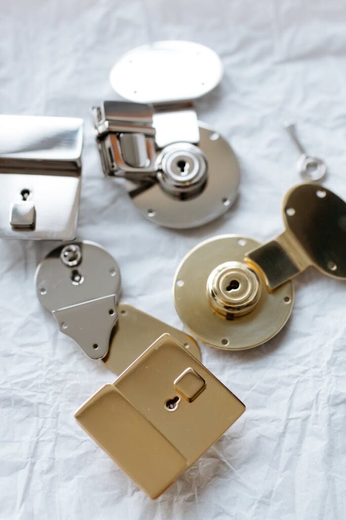 pexels-photo-6654806 Detailed shot of different metal locks and a key on a textured surface, highlighting security.